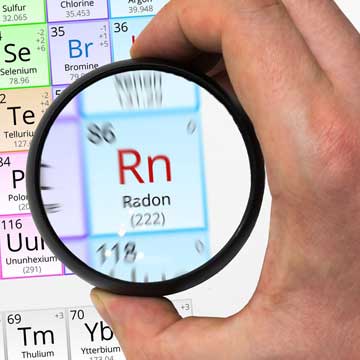Radon symbol - Rn. Element of the periodic table zoomed with mag